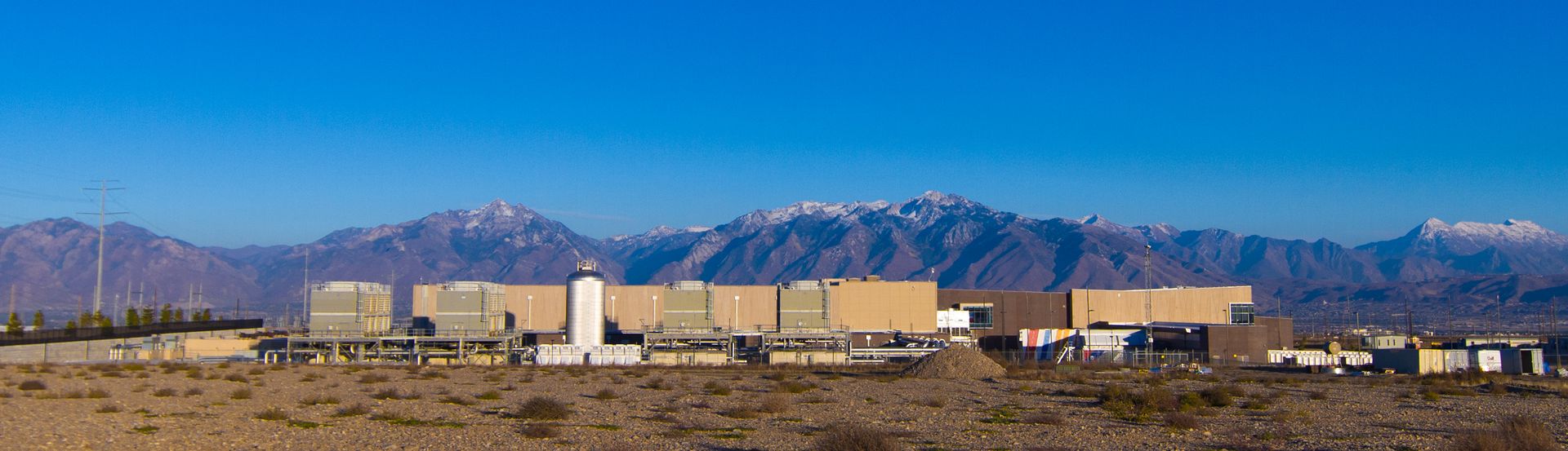 Data center campus in the Salt Lake valley with mountains behind it